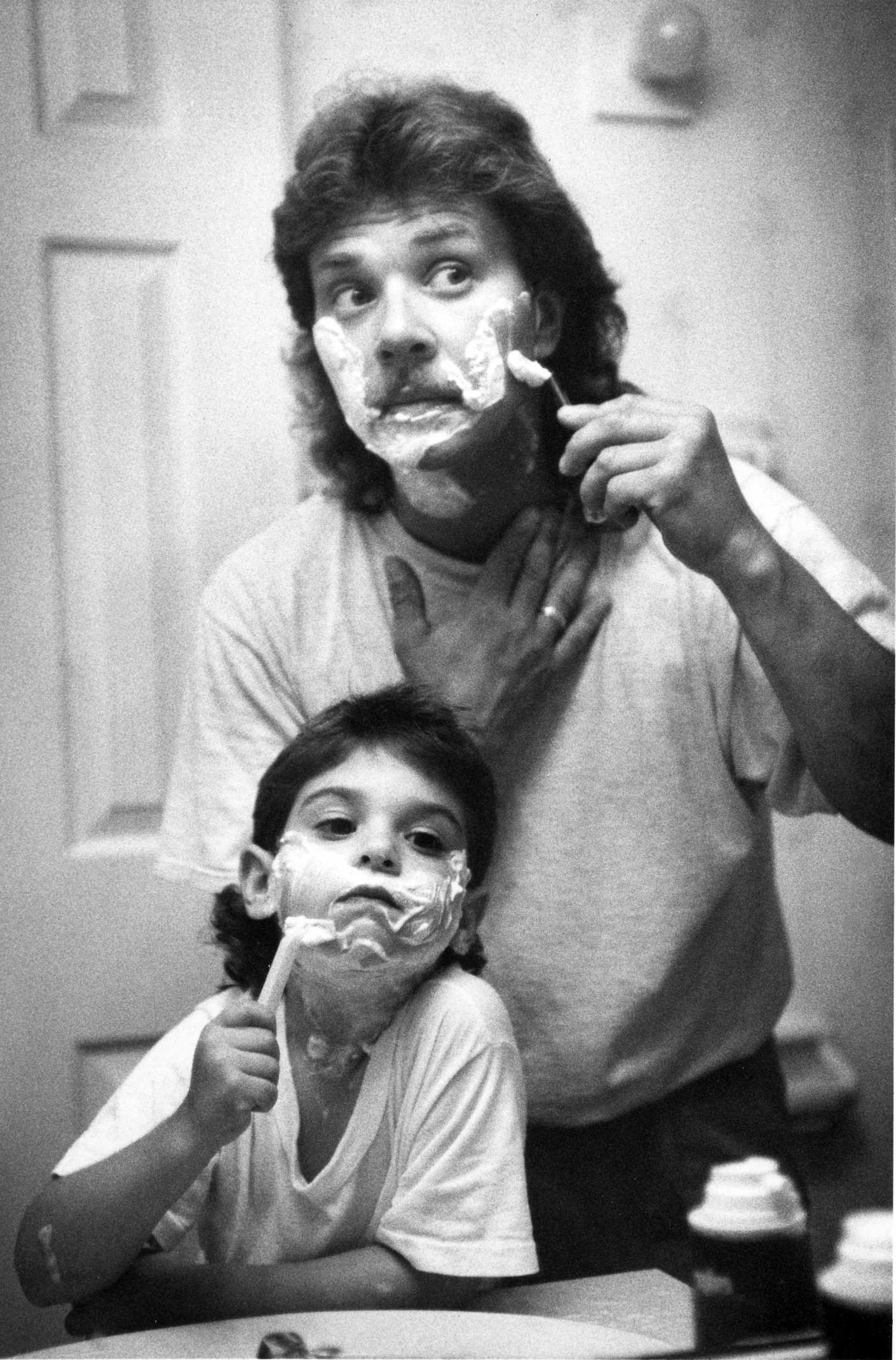 A morning shave for father and son. 1995