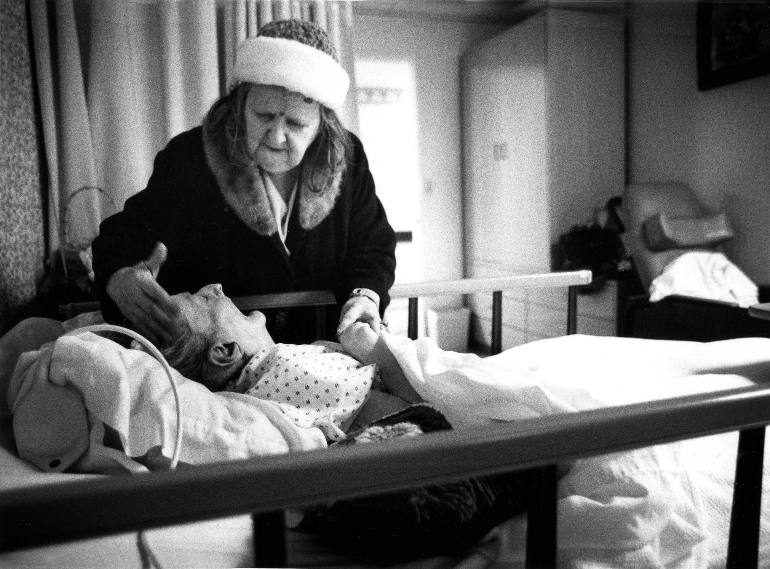 Rose, 80, visits her twin sister Mary at a nursing home. The two were inseparable their entire life until Mary become ill. This was part of a Valentine's Day story about the different ways we love. 1994.