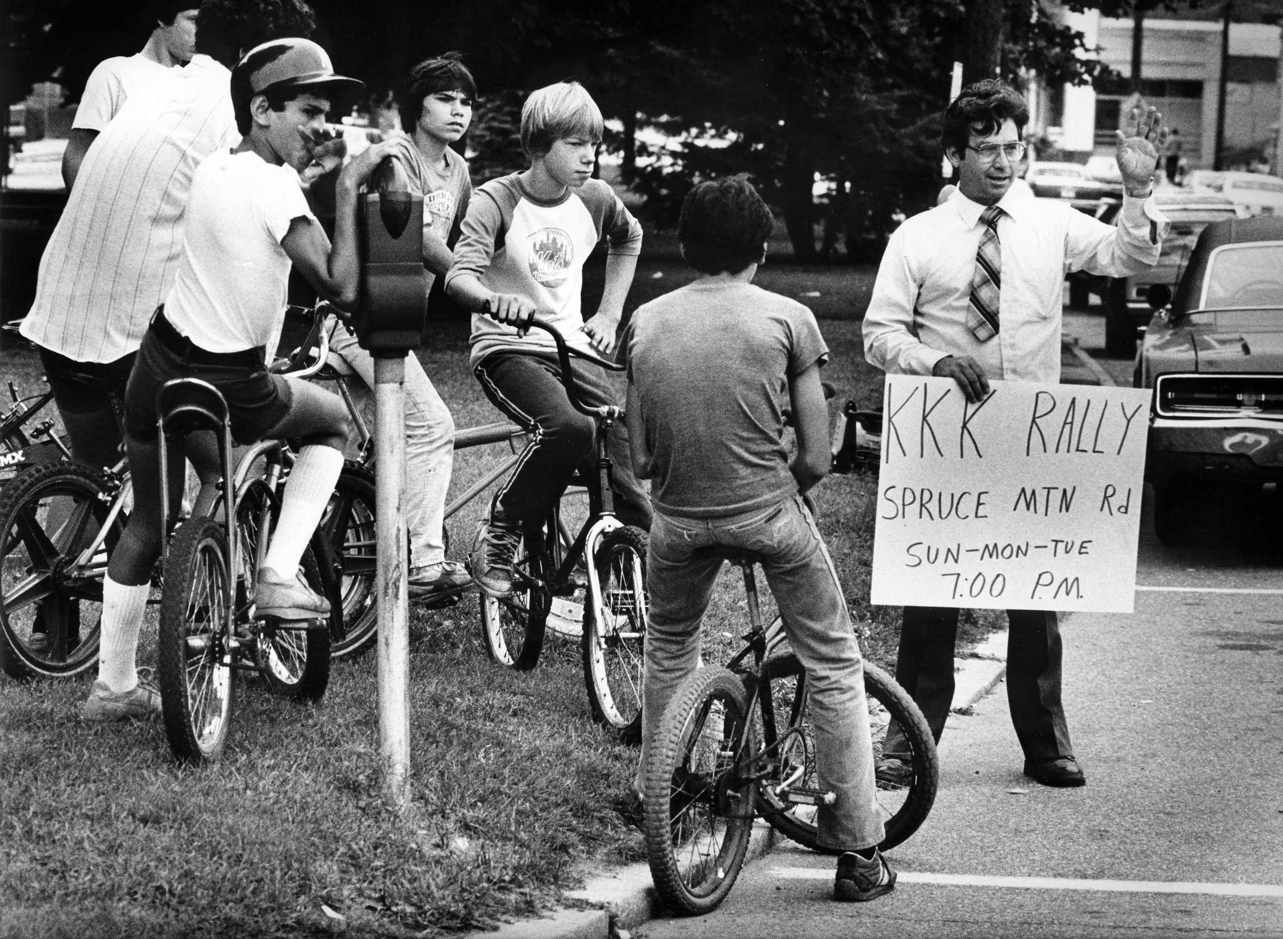 Racial tensions are exposed when the KKK plans a rally in Danbury. 1982