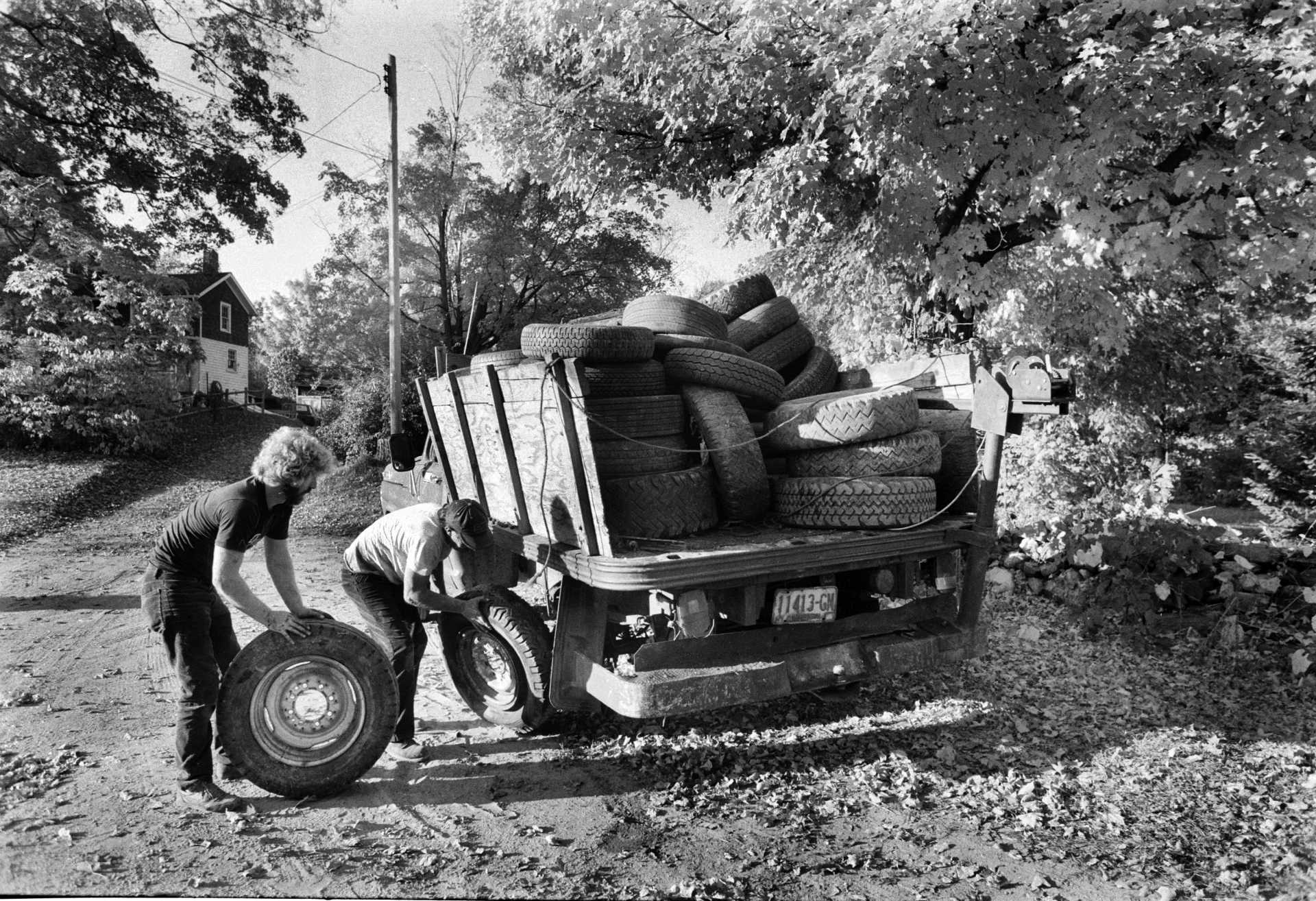 Changing a tire.  1984