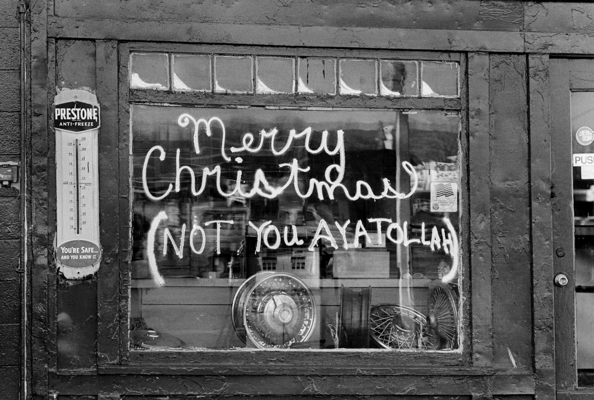 A Bethel gas station's window Christmas display stands in solidarity with over 50 American diplomats held hostage by the followers of Ayatollah Khomeini in Tehran, Iran. 1978