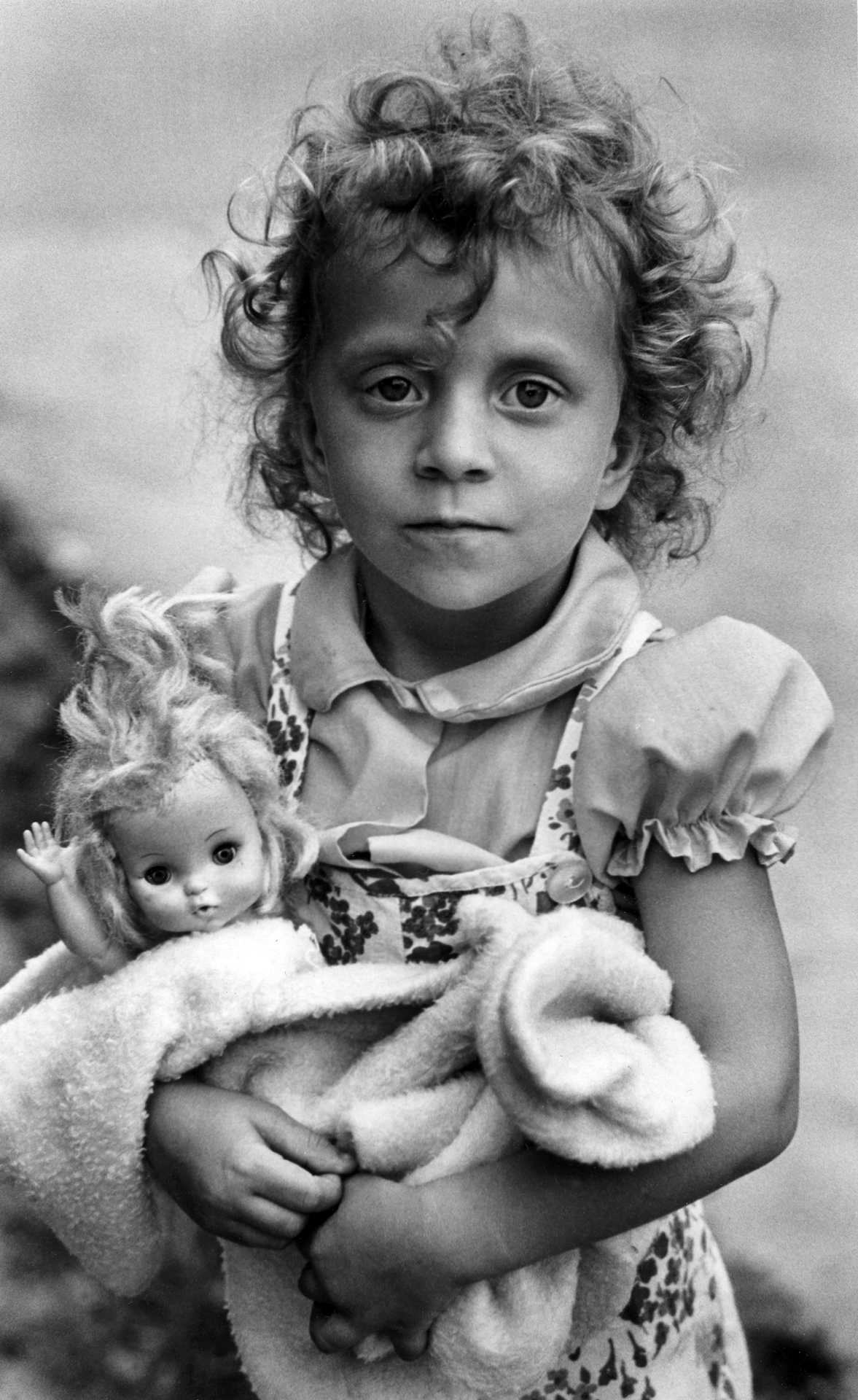 A little girl with her doll. 1970’s