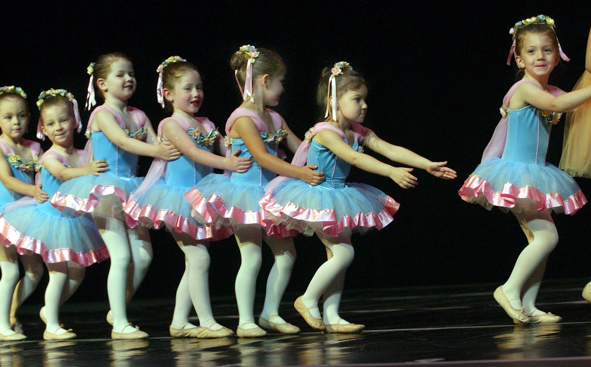 A pre-dance group of kids, ages 3 - 4, rehearse their number, ''Periwinkle Polka'' for an annual performance.